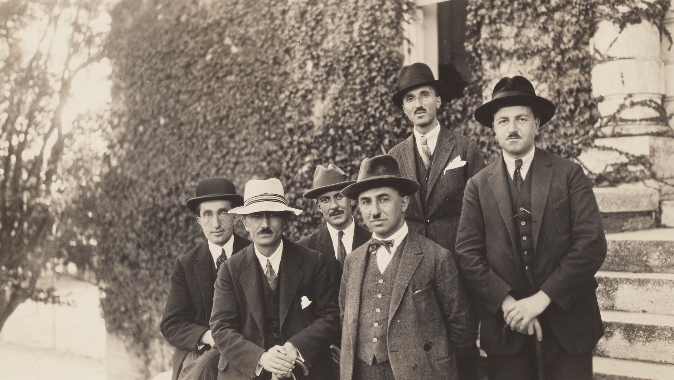 Turkish teachers at Robert College appear for the first time in European hats to comply with the government order to adopt the Western form of head-dress in place of fez.<br/> Left to right: Selim Bey, Hüseyin (Pektaş) Bey (former secretary to İsmet Pasha at Lausanne), Saim Bey, Keramet (Nigar) Bey (former secretary of deposed Caliph Abdülmecid Efendi), Feridun Bey and Hazım Bey.
