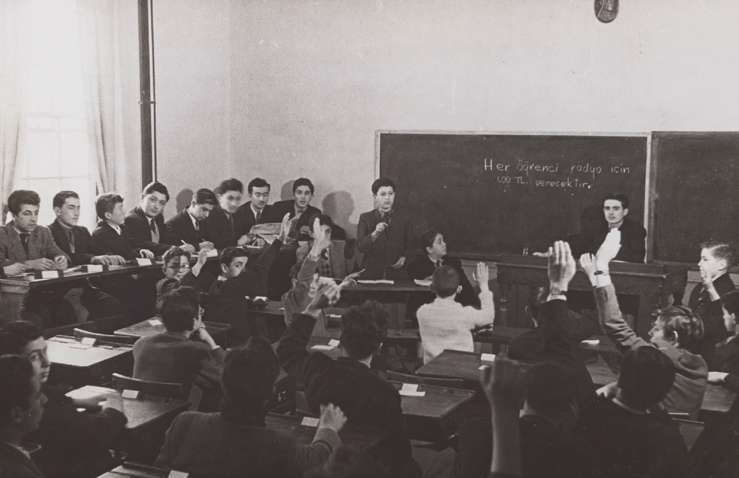 Robert Academy Council, voting for the fundraising for the radio. CU-RBML, RC Documents